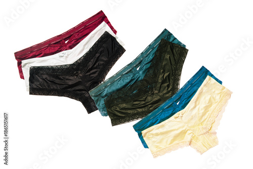 Underwear woman isolated. Collage of different luxurious elegant colorful  lacy thongs panties isolated on a white background. Set of sexy lace lingerie.