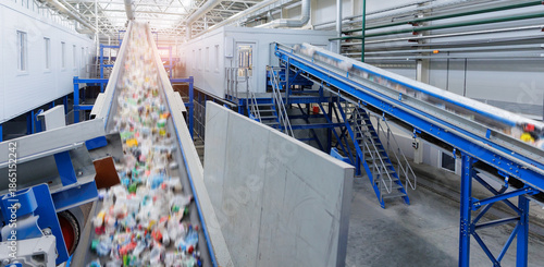 Automated recycling conveyor system in industrial facility © Parilov