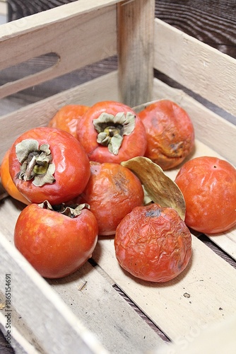 persimmons, orange sharons, autumn fruits, persimmons in a wooden box, ripe fruits