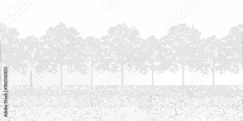 A grayscale landscape featuring a line of trees and rocky ground