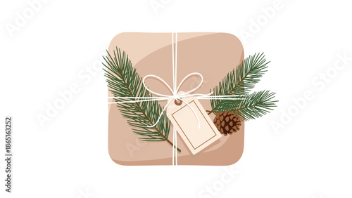 Top-down view of a Christmas gift box wrapped in brown kraft paper and decorated with green pine branches, a pine cone, and a tag.