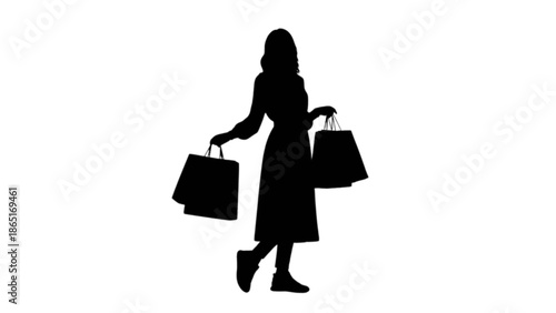 A female silhouette walking confidently while carrying several shopping bags after a successful shopping trip