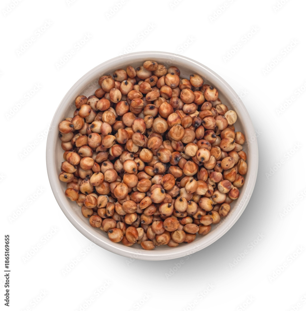 Fototapeta premium Sorghum grains isolated white background, top view