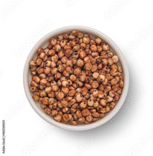 Sorghum grains isolated white background, top view © xamtiw
