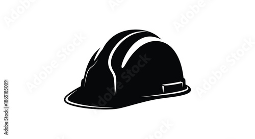 A striking black and white image showcases a construction helmet in a bold silhouette