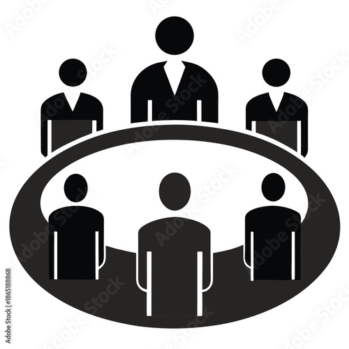 Title: Six business people sitting around a round table in a meeting with one person speaking