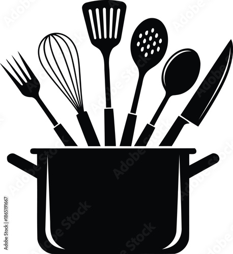 Kitchen utensils arranged in a pot with various cooking tools