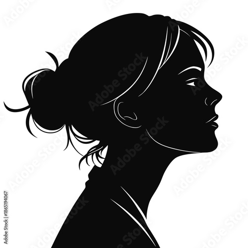 A striking profile view of a woman with her hair in a bun presented as a silhouette