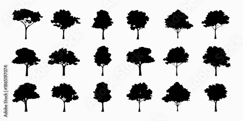 Collection of diverse tree silhouettes against a clean white background