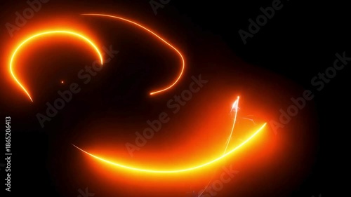 Abstract animation of fast-moving neon light streaks in orange, blue, and pink colors, scribbling chaotically against a black background.