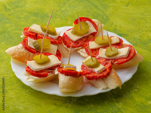 Tasty appetizer on white plate