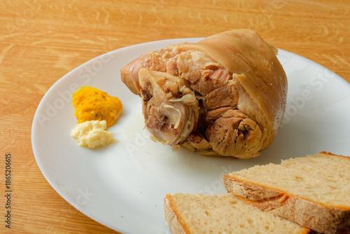 Cooked pork knuckle on plate