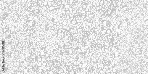 A dense monochromatic pattern of circular and organic shapes fills the frame