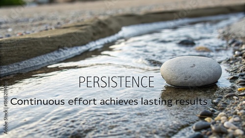 A Single Stone Steadfastly Positioned in a Gently Flowing Silver Stream Demonstrating the Power of Persistence