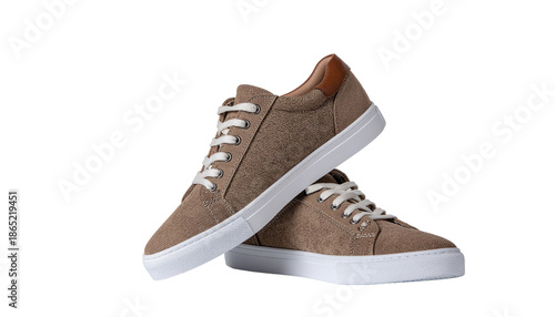 Two stacked brown canvas shoes with white laces and soles are visible against a white background png with transparency