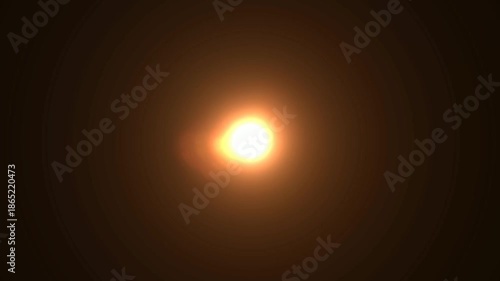 golden  light star burst motion graphics, sun rays effect.optical flare with light rays on black background Loop.