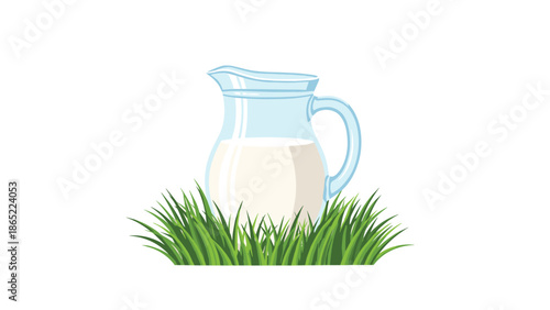 Clear glass pitcher filled with fresh white milk, gracefully placed on a vibrant patch of green grass, symbolizing natural dairy.