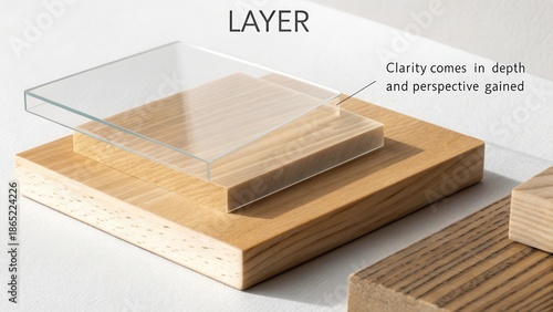 Transparent acrylic layer on a wooden base demonstrating material contrast and clarity
