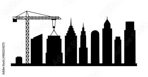 Silhouette of a city skyline with a construction crane lifting a building section