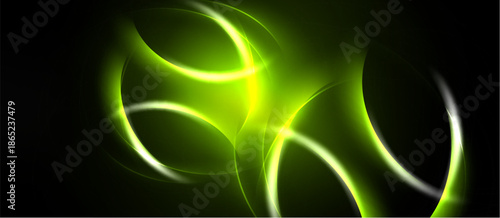 Abstract green light shapes swirl against dark background. Bright curves create dynamic energy, glowing effect visible.