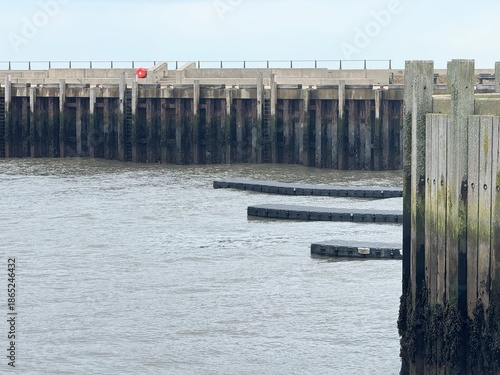 Quayside on dull day with pontoons into water