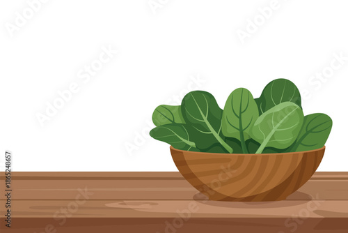 A wooden bowl filled with fresh spinach sits on a wooden table.
