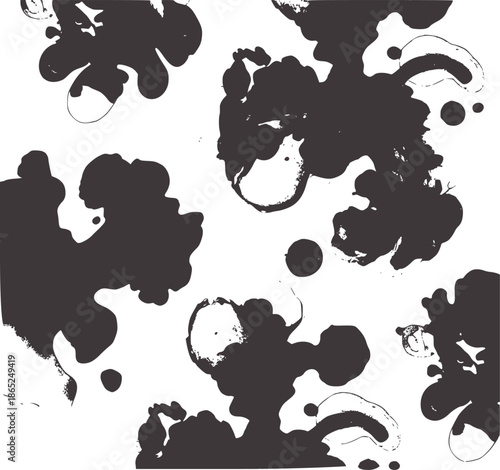 Monochrome abstract inkblot texture with irregular shapes and splatters