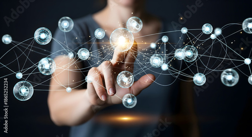 Modern illustration of human in the loop with a hand touching glowing digital nodes, representing human judgment, balance, and guidance within automated and intelligent systems.