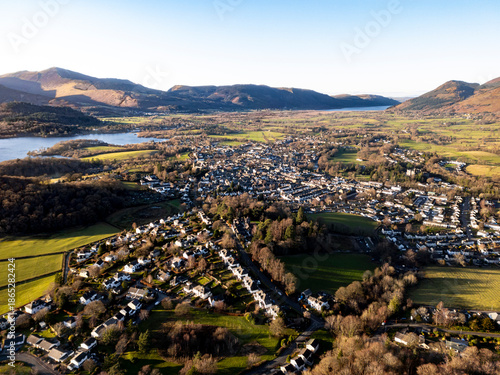 Obraz na płótnie Aerial of small mountain town at sunset - Keswick, Cumbria