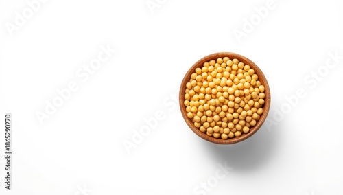 Soybeans served in a wooden bowl on white background, highlighting protein-rich foods for nutrition