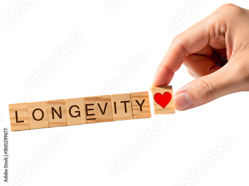 Hand placing heart on longevity tiles.