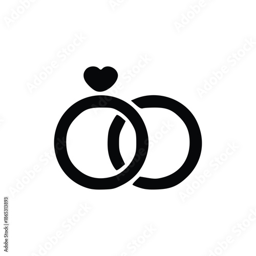 A simple black and white graphic icon representing two intertwined wedding rings, one adorned with a small heart.