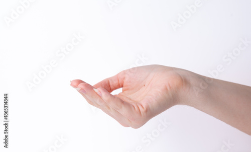 Hand reaching out against a plain white background