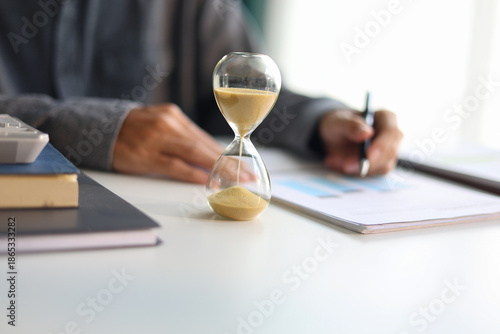 Photos Selective focus on sand clocks