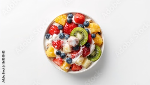 Fresh fruit salad with yogurt in a bowl, highlighting nutritious breakfast choices