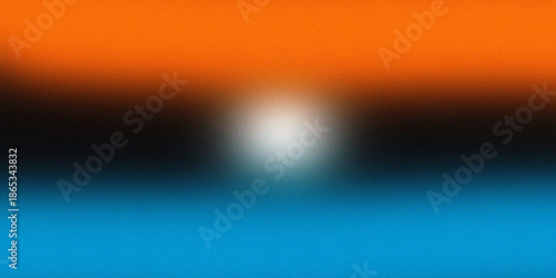 Abstract orange and blue background with central light and grainy texture