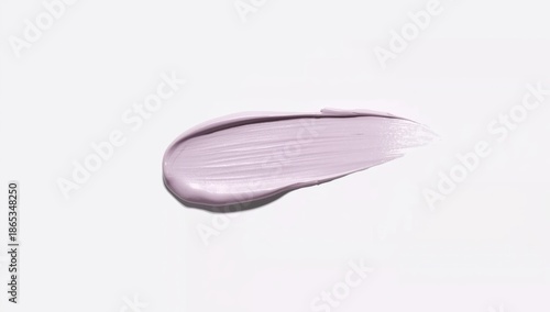 Isolated cream swatch on light purple background, intended for cosmetic application, World Skin Awareness Day