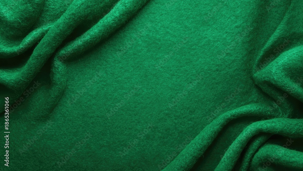 Obraz premium Textile surface on green felt background with fabric texture for editorial header background, Earth Day
