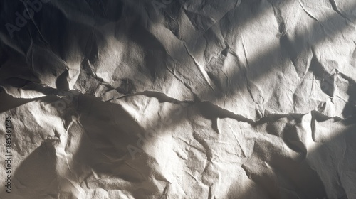 Wallpaper Mural Strong directional sunlight casts dramatic shadows across a textured white surface. Torontodigital.ca