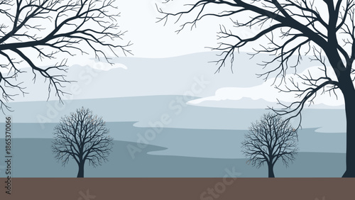 Winter landscape with bare trees in blue tones for depression or Blue Monday themes
