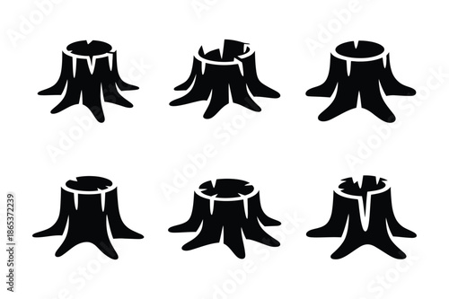 Solid black silhouettes of cut tree stumps