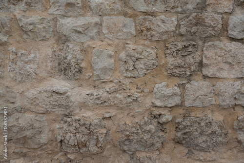 Background with texture of roughly broken marble in construction