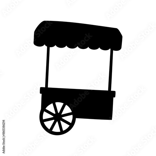Silhouette of a charming old fashioned street food cart on wheels