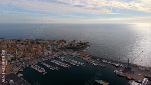 Aerial drone flying over palamos spain marina and town