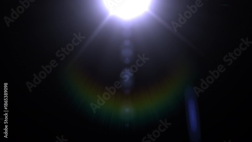 Cinematic Top Lens Flare with Rainbow Halo and Alpha Channel.Optical Light Leak Overlay with Vertical Ghosting and Bokeh.Transparent Lighting Effect
