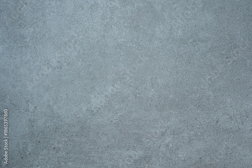Blue toned concrete wall texture background with fine details and surface grain