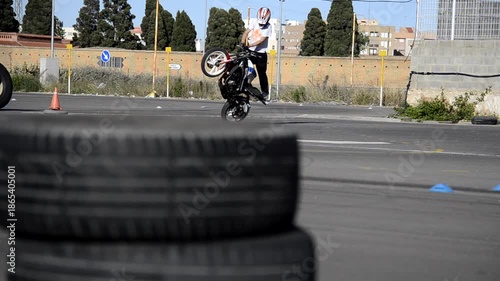Adrenaline Motorcycle Stunt Riding on Professional Circuit