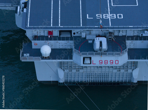Aerial view of the imposing LHD Trieste with its prominent 'L 9890' designation casting a stark shadow, Trieste,, Italy.
