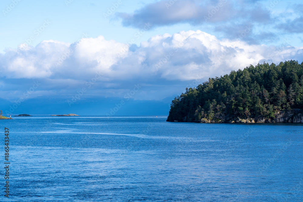 Fototapeta premium Coastal scenery on a sunny day with clouds
