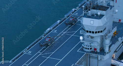 Aerial view of helicopters poised on the flight deck of the LHD Trieste, against the backdrop of the Adriatic Sea, Trieste, Italy.